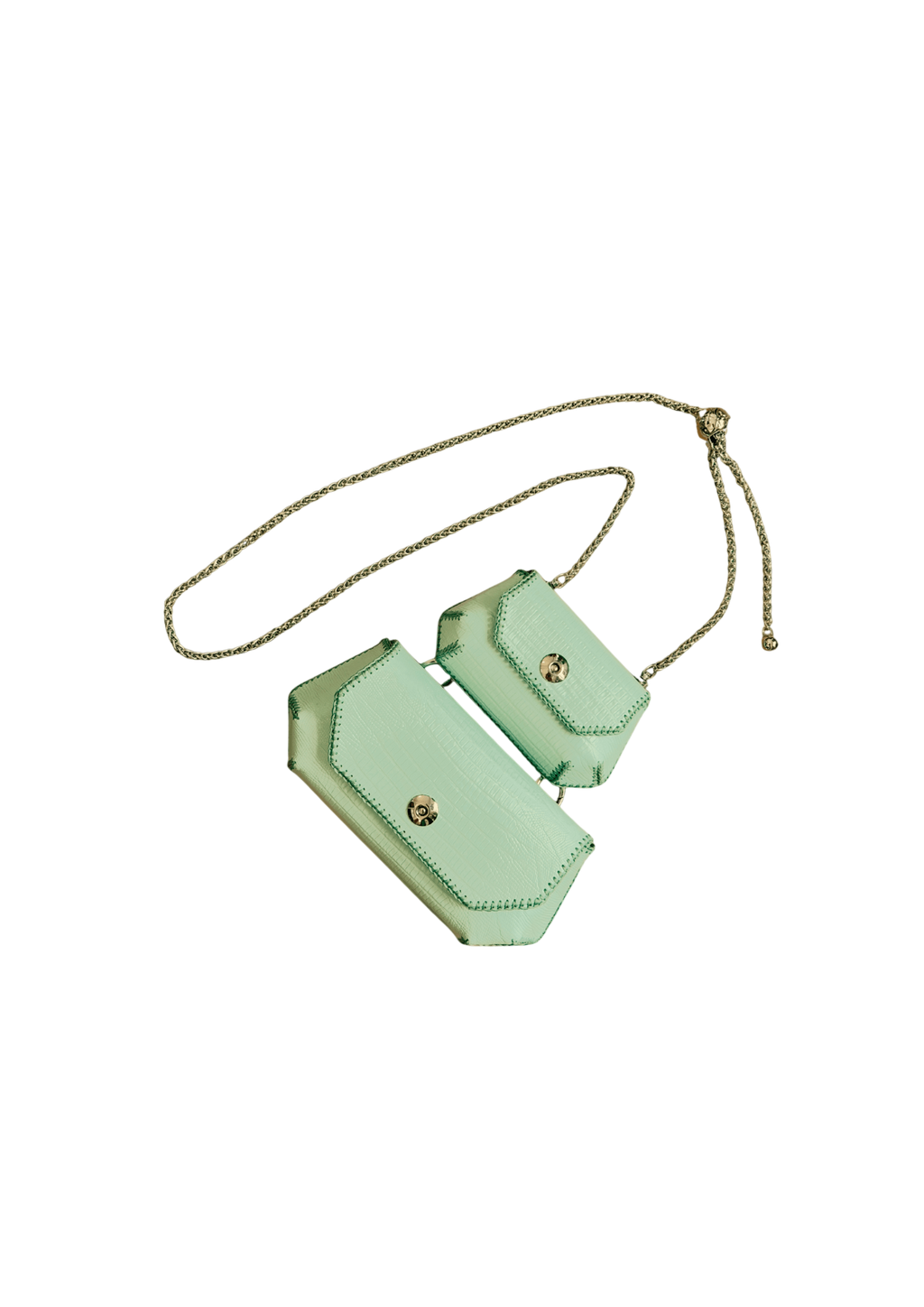Mint green crossbody bag with gold accents on a beige background