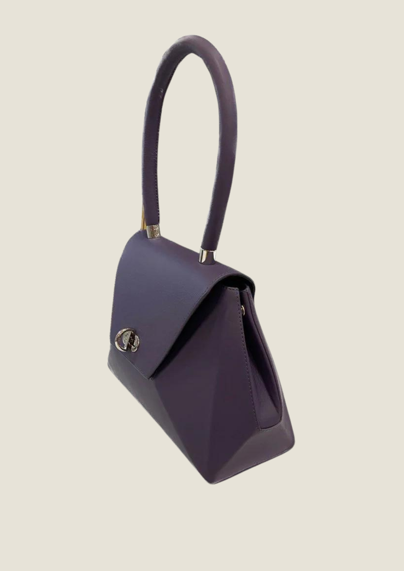 Geometric top handle bag