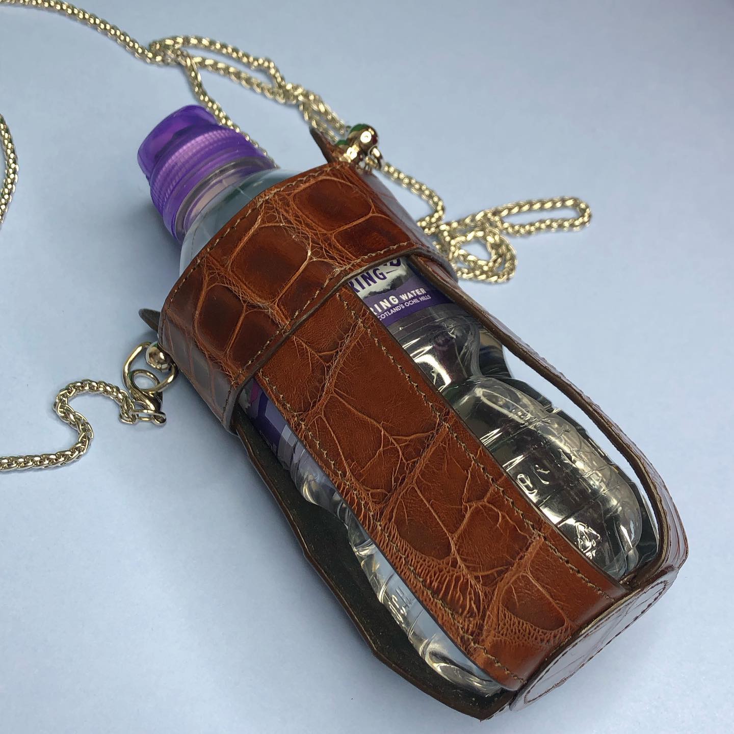 Water bottle case made of natural crocodile