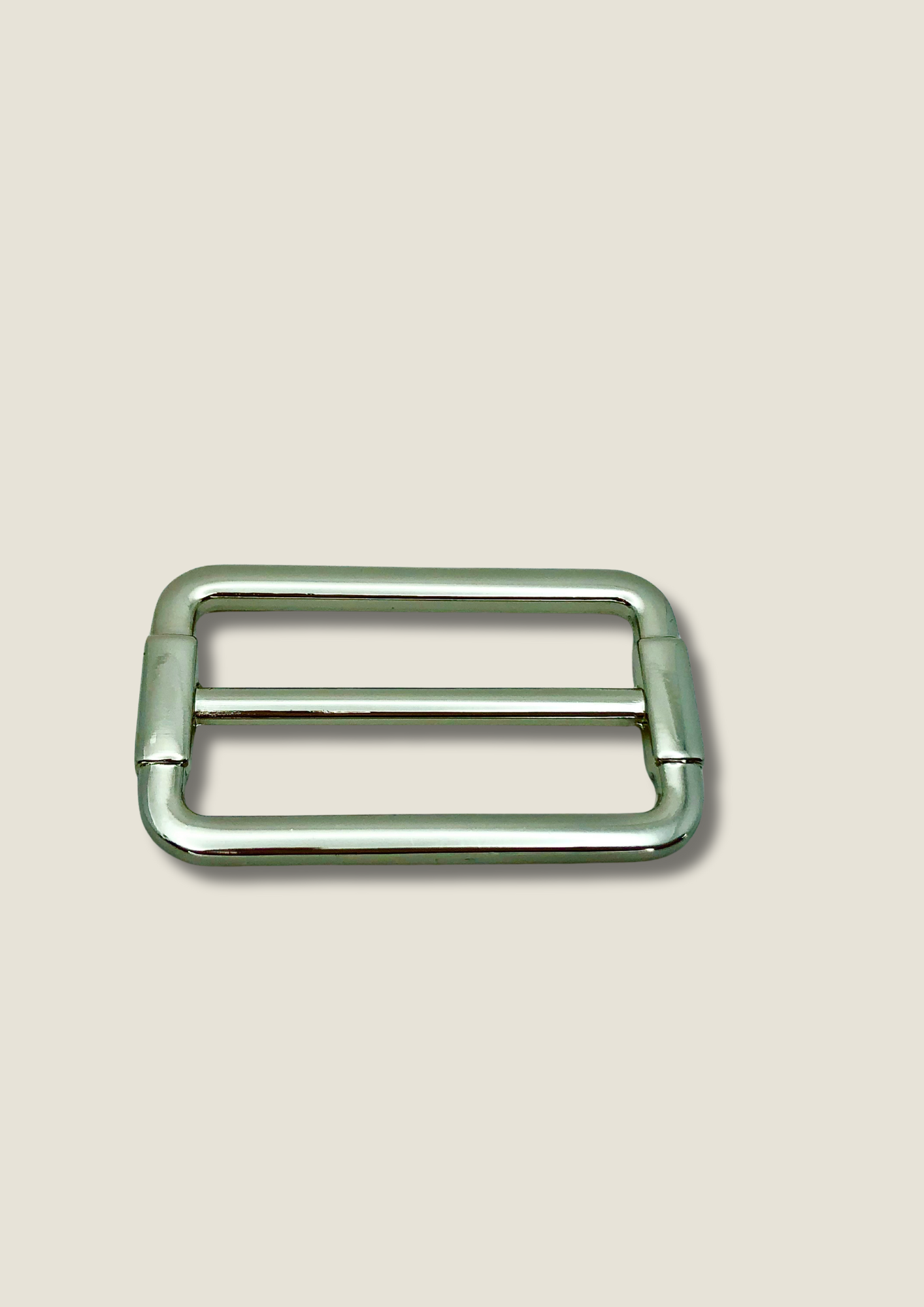 Tri-glide strap buckle