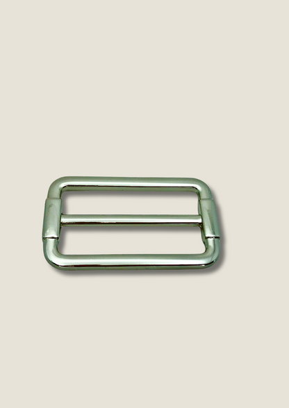 Tri-glide strap buckle