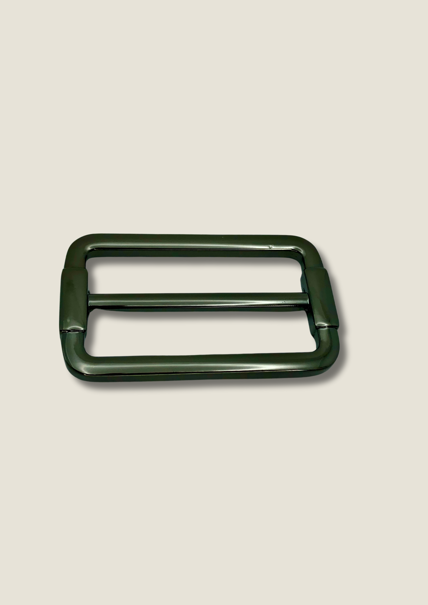 Tri-glide strap buckle