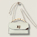 Small leather bag with bamboo handle